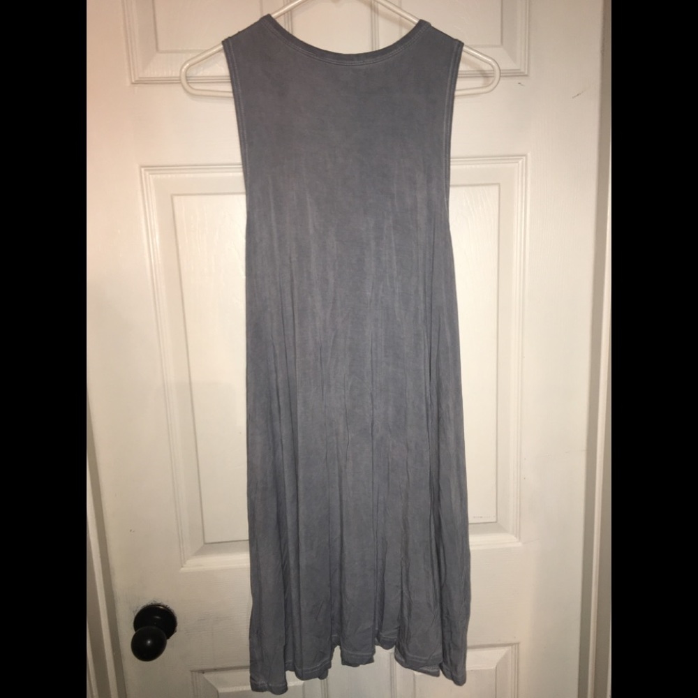 Cute Can be worn as a dress or with leggings.